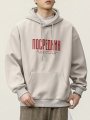 Light beige cotton hoodie with red graphic text and drawstring hood.
