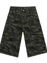 Wide-leg denim culottes in Army Green camouflage print with distressed details.