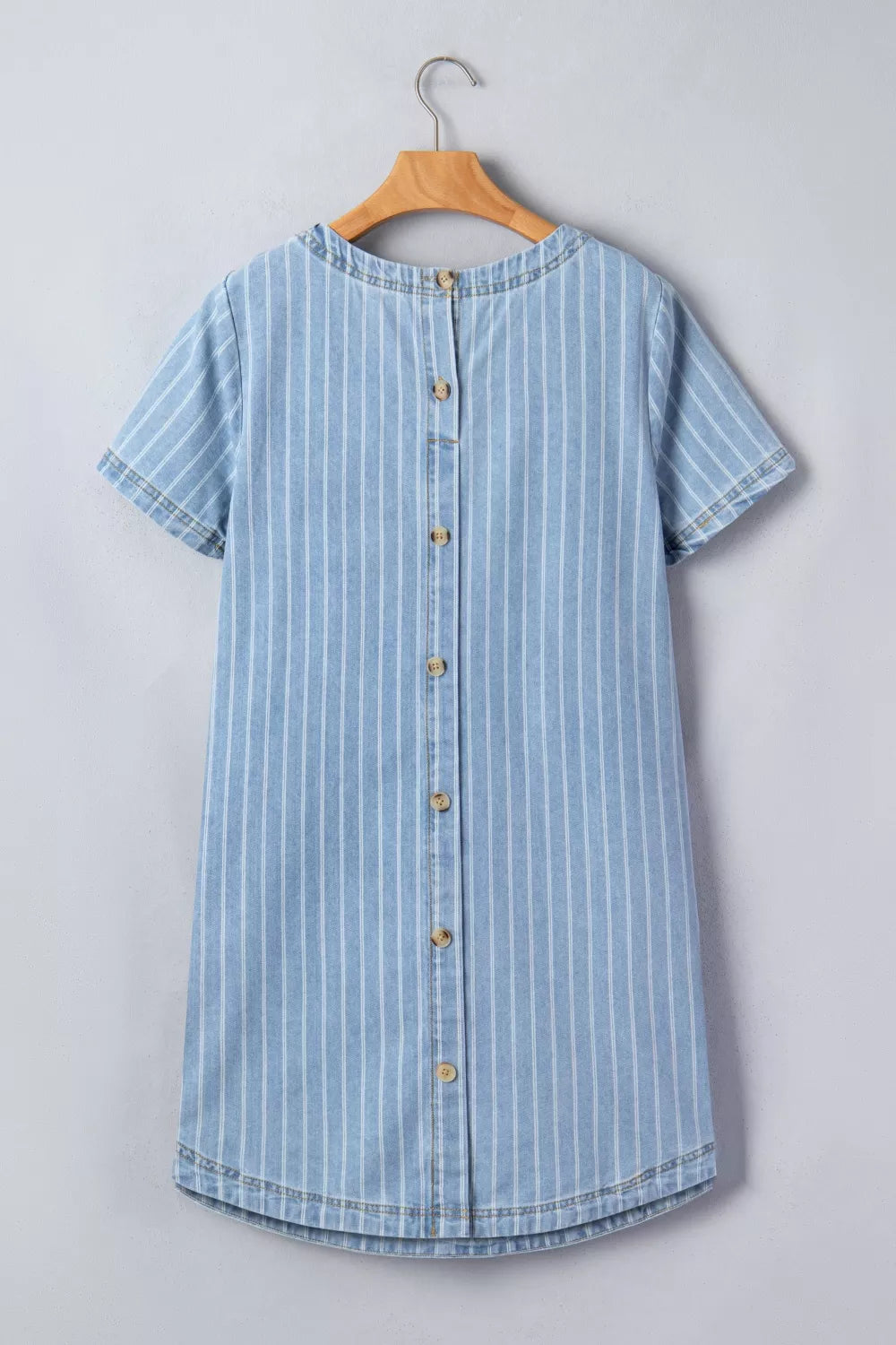 Denim mini dress with vertical white stripes, short sleeves, and a button-down back.