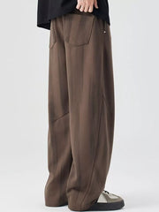 Brown striped jogger pants with back pockets and drawstring detail.