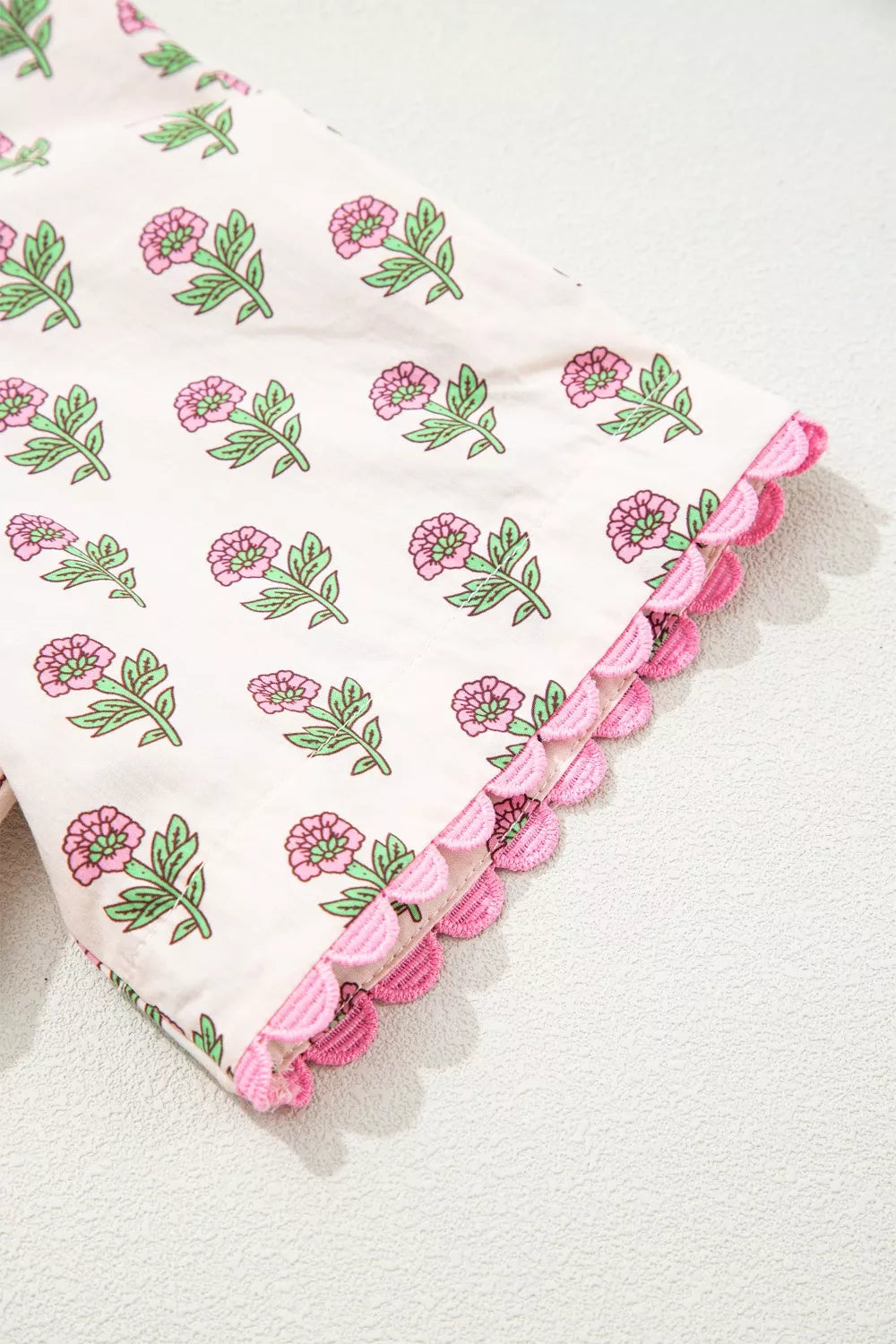 Floral midi dress with pink flowers and scalloped trim