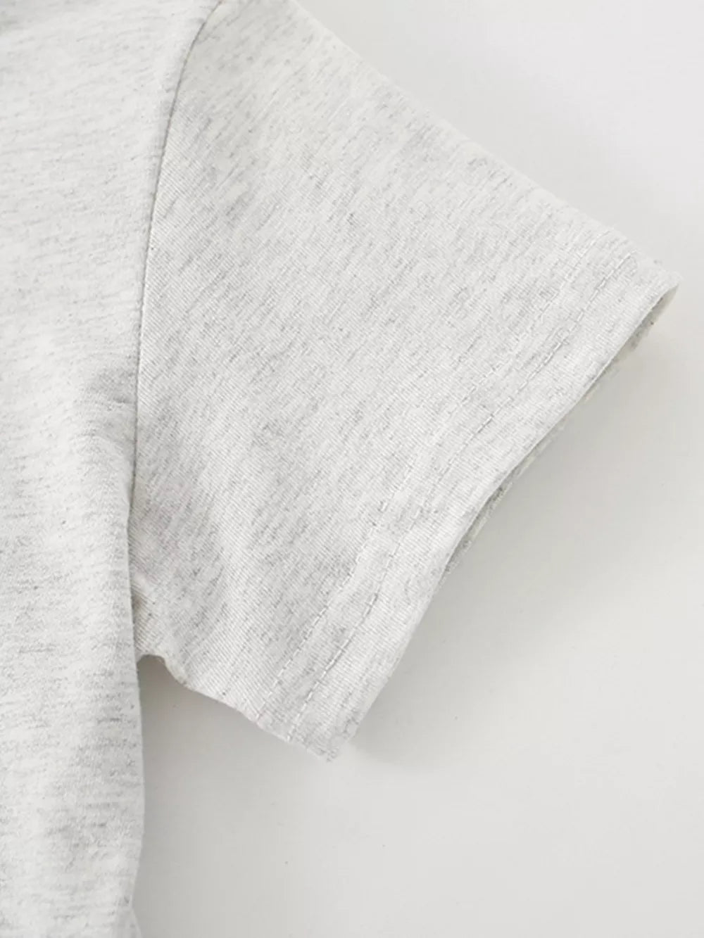 Toddler grey marl cotton t-shirt with short sleeves and a crew neck.