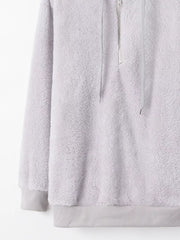 Light gray cozy fleece half-zip hoodie with drawstring and ribbed cuffs and hem.