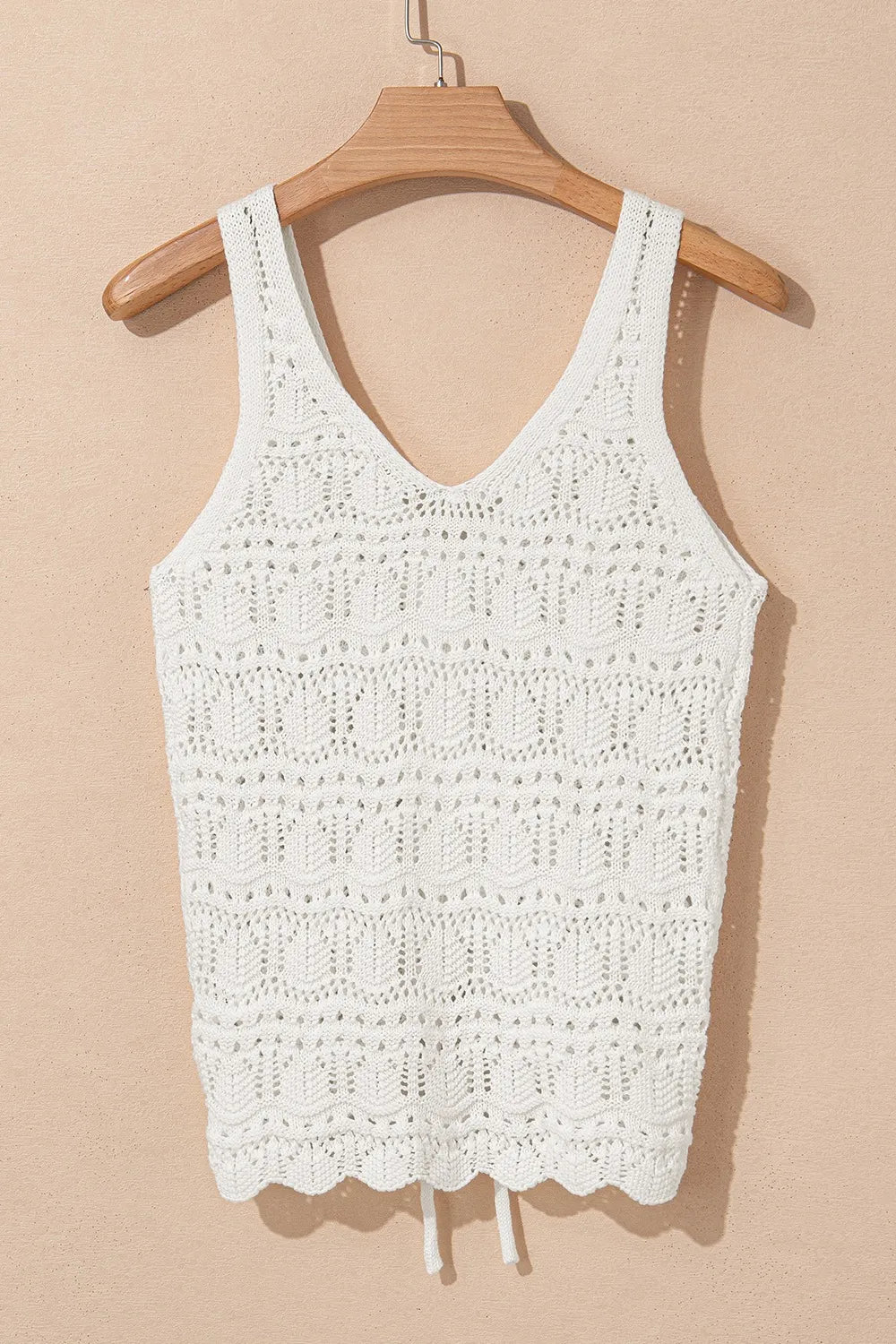 White crochet tank top with V-neck and ruched front detail.