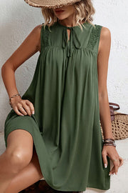 Army green viscose trapeze dress with keyhole neckline and crochet shoulder detail