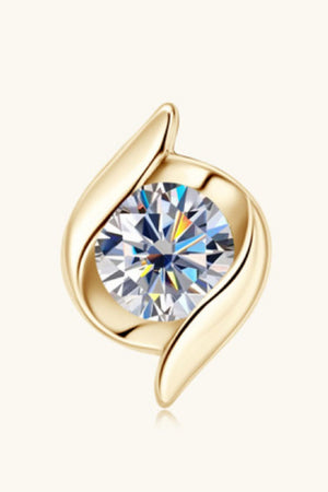 Gold stud earrings with a clear solitaire gemstone set in a sculpted 925 gold swirl design.