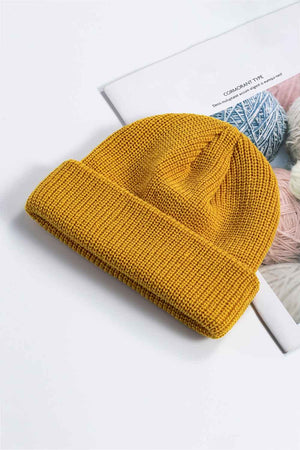 Mustard yellow ribbed knit beanie with a turn-up cuff