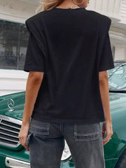 Black graphic t-shirt with padded shoulders and round neck.