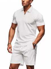 White textured polo shirt and shorts ensemble for men, short sleeves, v-neck collar.
