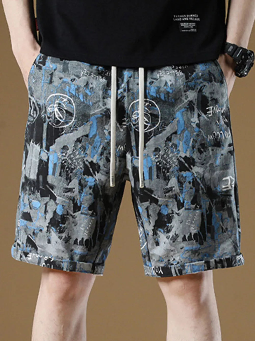 Casual cotton-blend chino shorts with adjustable drawstring and abstract graphic print in dark gray.