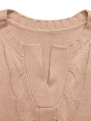 Pink acrylic cable knit sweater vest with V-neck and ribbed trim.
