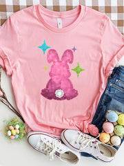 Pink t-shirt with a glitter bunny silhouette and sparkling stars.