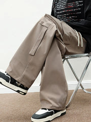 Light brown cargo pants with drawstring and button flap pockets.
