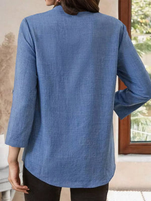 Blue textured maternity shirt with 3/4 sleeves and curved hem