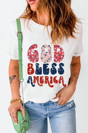 White graphic tee with distressed "God Bless America" text in red, white, and blue stars pattern.