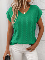 Green cable knit V-neck vest with short sleeves and braided texture detail.