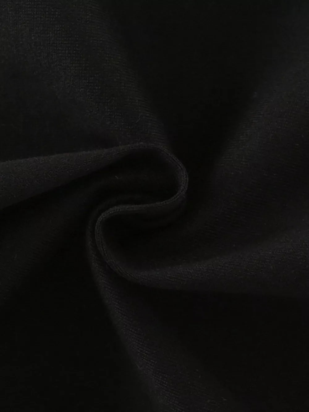 Black toddler t-shirt fabric detail.