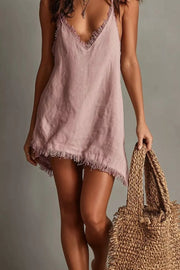 Dusty pink cotton cami dress with V-neck and frayed hem details.