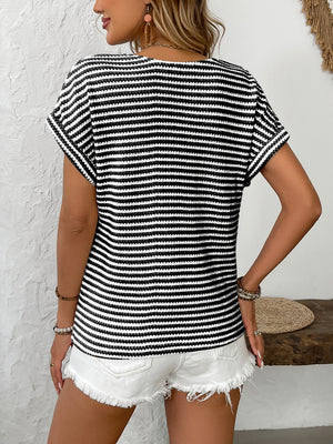 Black and white striped knit top with short sleeves and a button-down front.