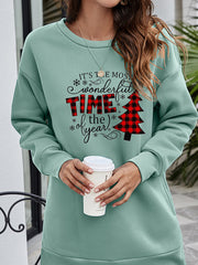 Sage tunic sweatshirt with holiday graphic and buffalo plaid Christmas tree.