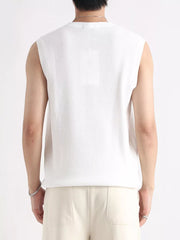 Men's white textured knit sleeveless tank top with a crew neck.