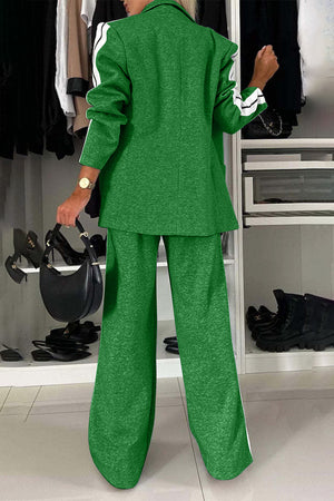 Green track stripe blazer and wide leg trouser set with white sleeve stripes.