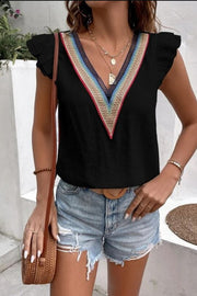 Black flutter sleeve blouse with colorful embroidered V-neck trim and ruffle sleeves.