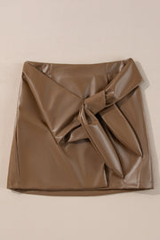 Brown faux leather mini skirt with a knot-front detail.