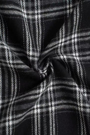 Black plaid palazzo lounge trousers with a soft, brushed texture.