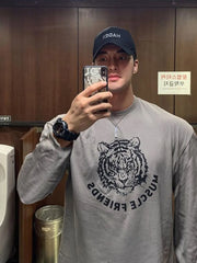 Gray long sleeve tee with bold tiger graphic and text