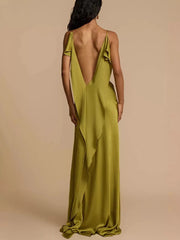 Lustrous satin maxi dress with deep V back and ruffle detail.