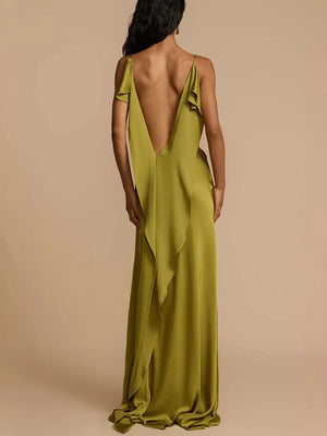 Lustrous satin maxi dress with deep V back and ruffle detail.