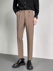 Men's taupe ankle-length slim fit trousers with double button waist detail.