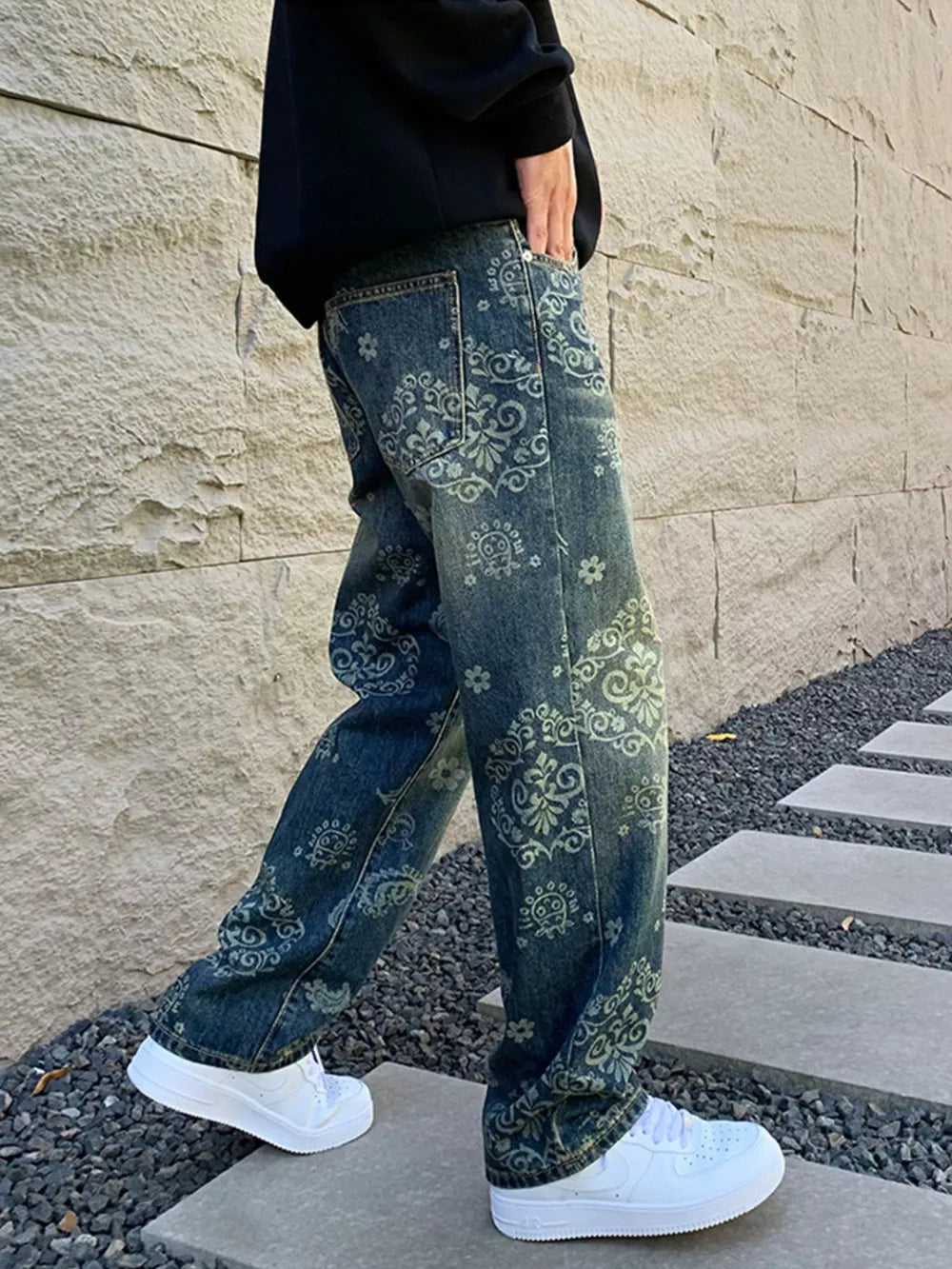 Men's relaxed fit jeans in dark wash denim with an all-over heritage floral print.