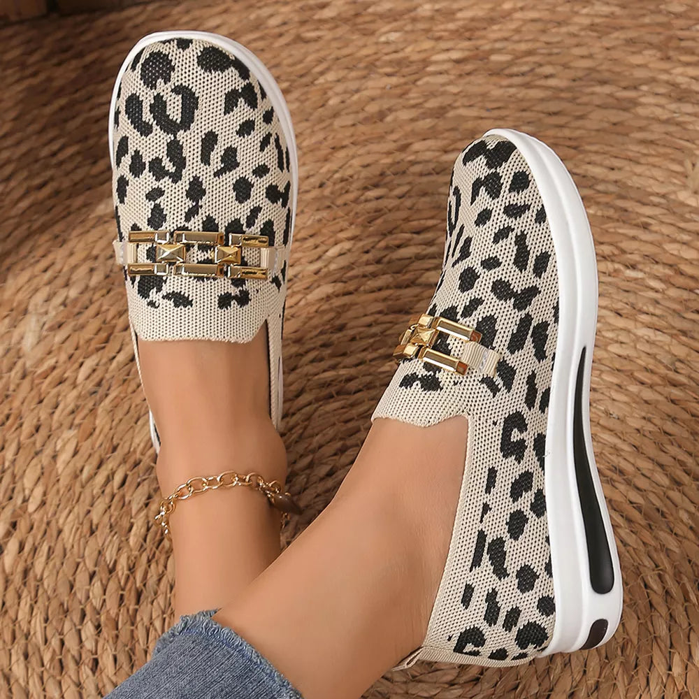 Leopard print mesh slip-on slippers with gold buckle detail and white sole.