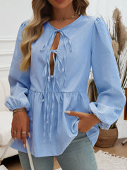 Sky blue striped peplum blouse with keyhole neckline and tie details