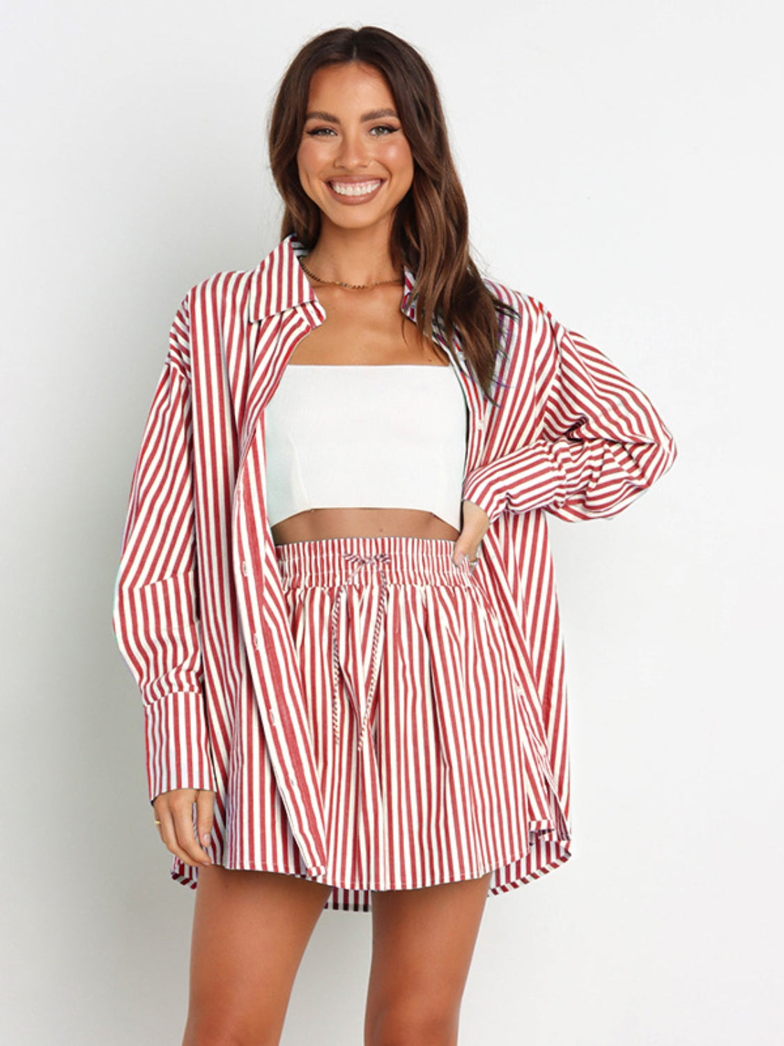 Oversized red and white stripe shirting set with button-down shirt and drawstring shorts.