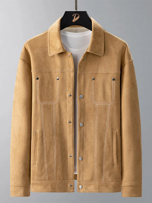 Caramel trucker jacket with white contrast stitching and snap buttons.