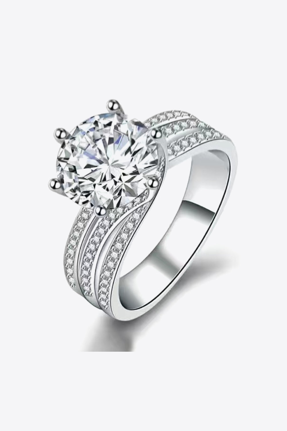Silver moissanite engagement ring with pavé band