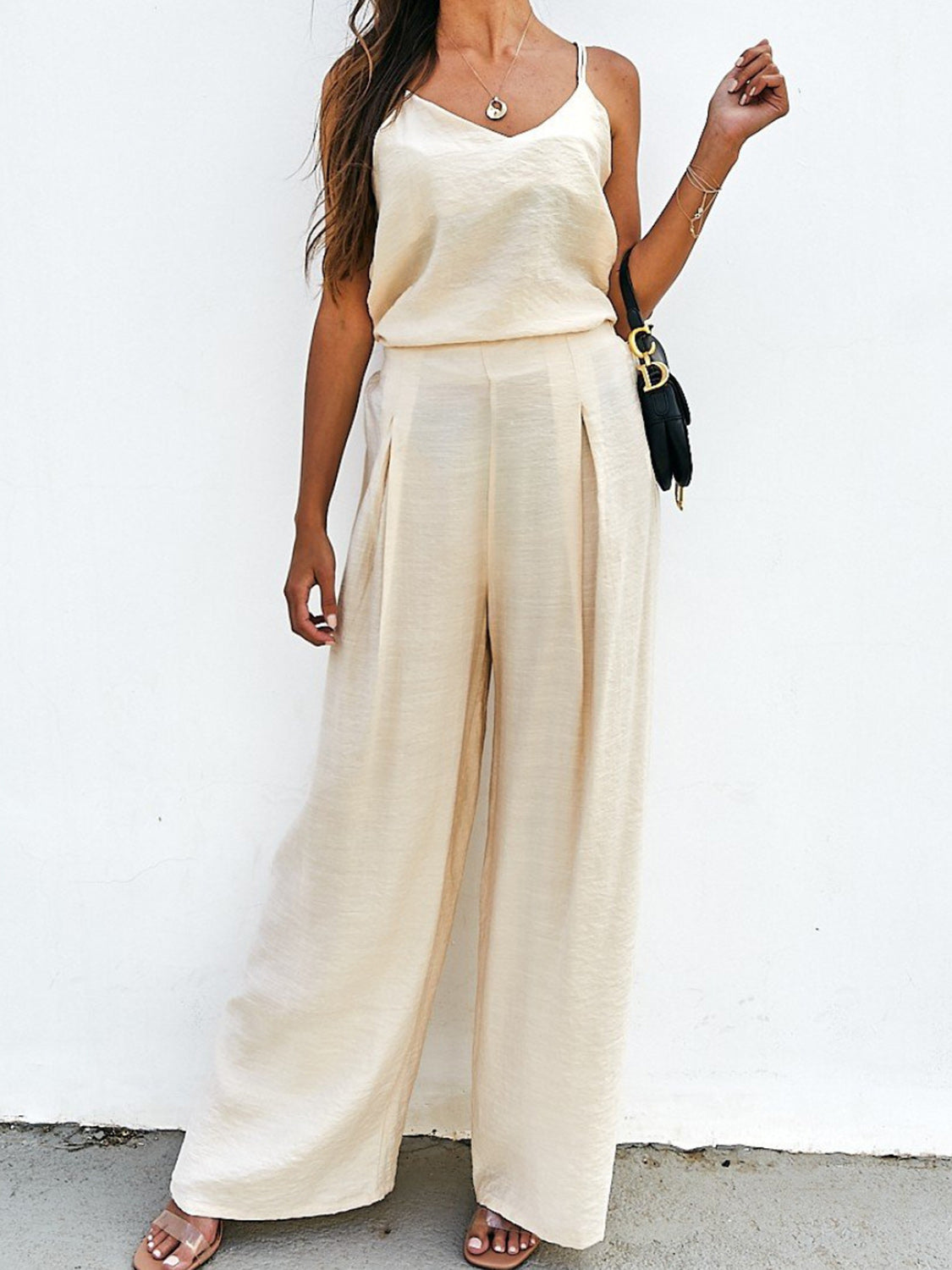 Cream cami and pleated palazzo pants outfit set with a textured finish.