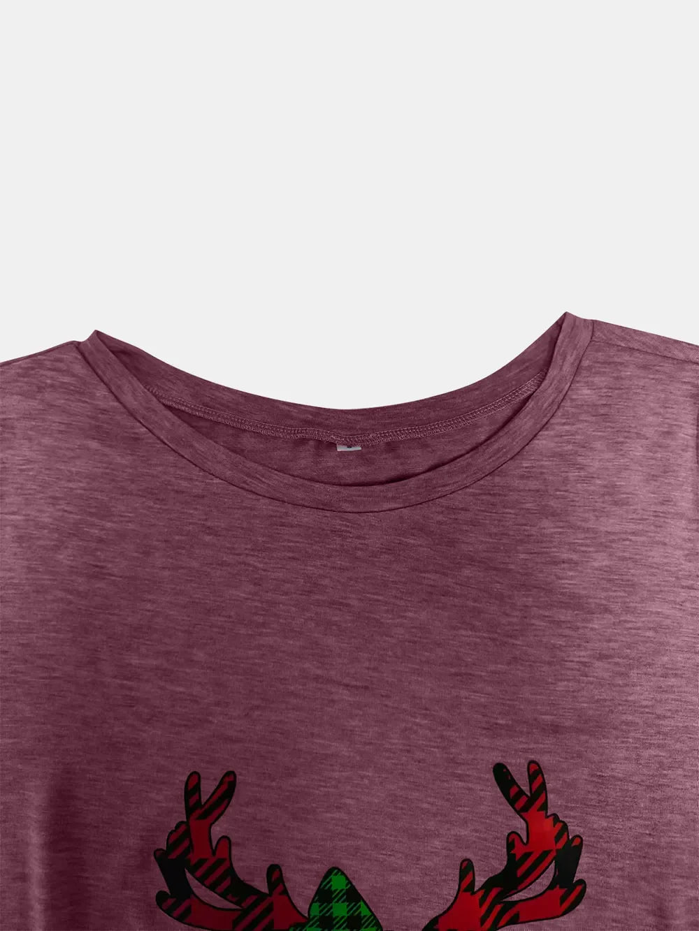 Maroon tee with asymmetrical button detail and plaid reindeer graphic.