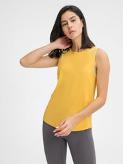 Yellow mesh-back performance tank top with a round neckline and sleeveless design.