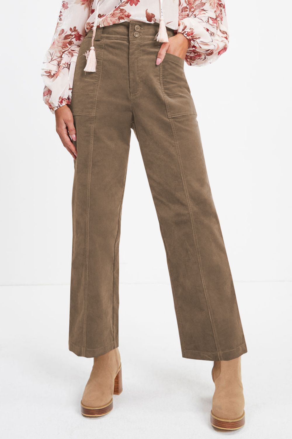 Seamed front wide leg trousers in caramel corduroy with button closure and patch pockets.