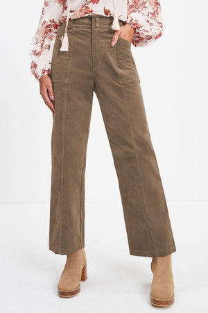 Seamed front wide leg trousers in caramel corduroy with button closure and patch pockets.