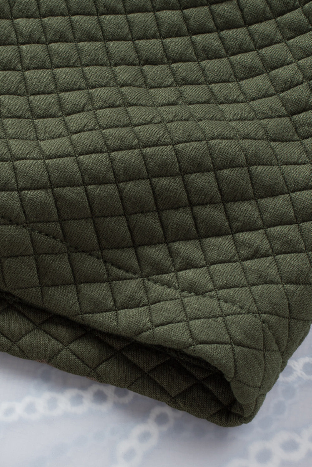 Army green quilted overshirt with diamond pattern detail