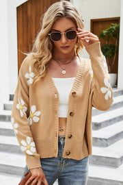 Camel knit button-down cardigan with white daisy embroidery, V-neck, and ribbed trim.