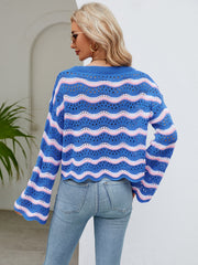 Blue crochet crop sweater with pink and white wavy stripes and scalloped hem.