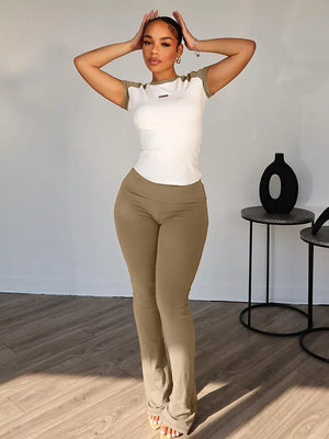 Chic contrast two-piece set: white tee with contrast sleeves and camel flared pants.