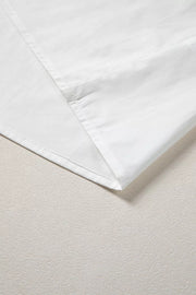 White cotton shirt with pleated detail and stitched hem