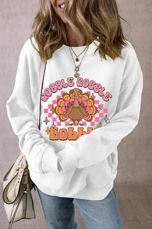 White graphic sweatshirt with retro turkey and "Gobble Gobble" text.